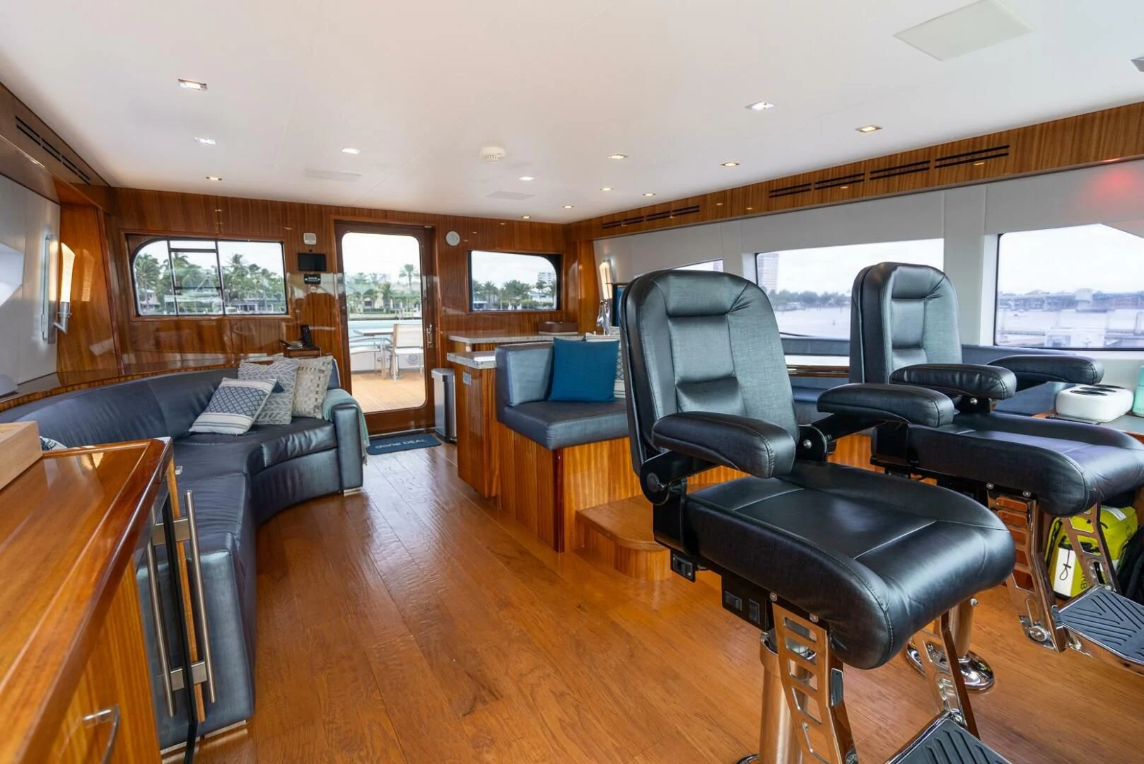 a living room with a couch and a table aboard RITZ SEA Yacht for Sale