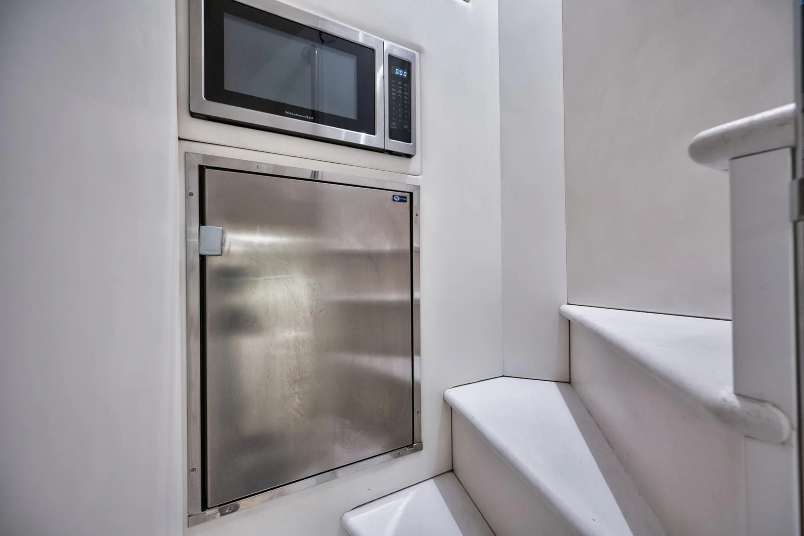 a microwave oven on a shelf aboard RITZ SEA Yacht for Sale