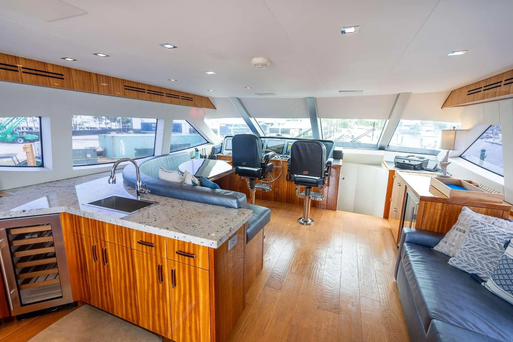 a large kitchen with a large window aboard RITZ SEA Yacht for Sale