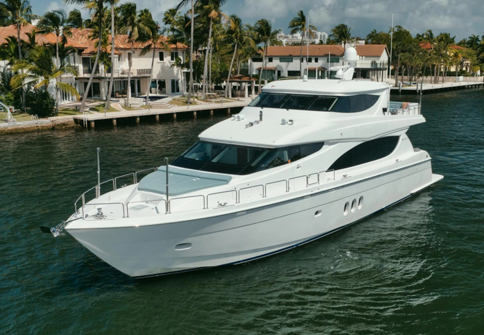 a white yacht docked aboard RITZ SEA Yacht for Sale