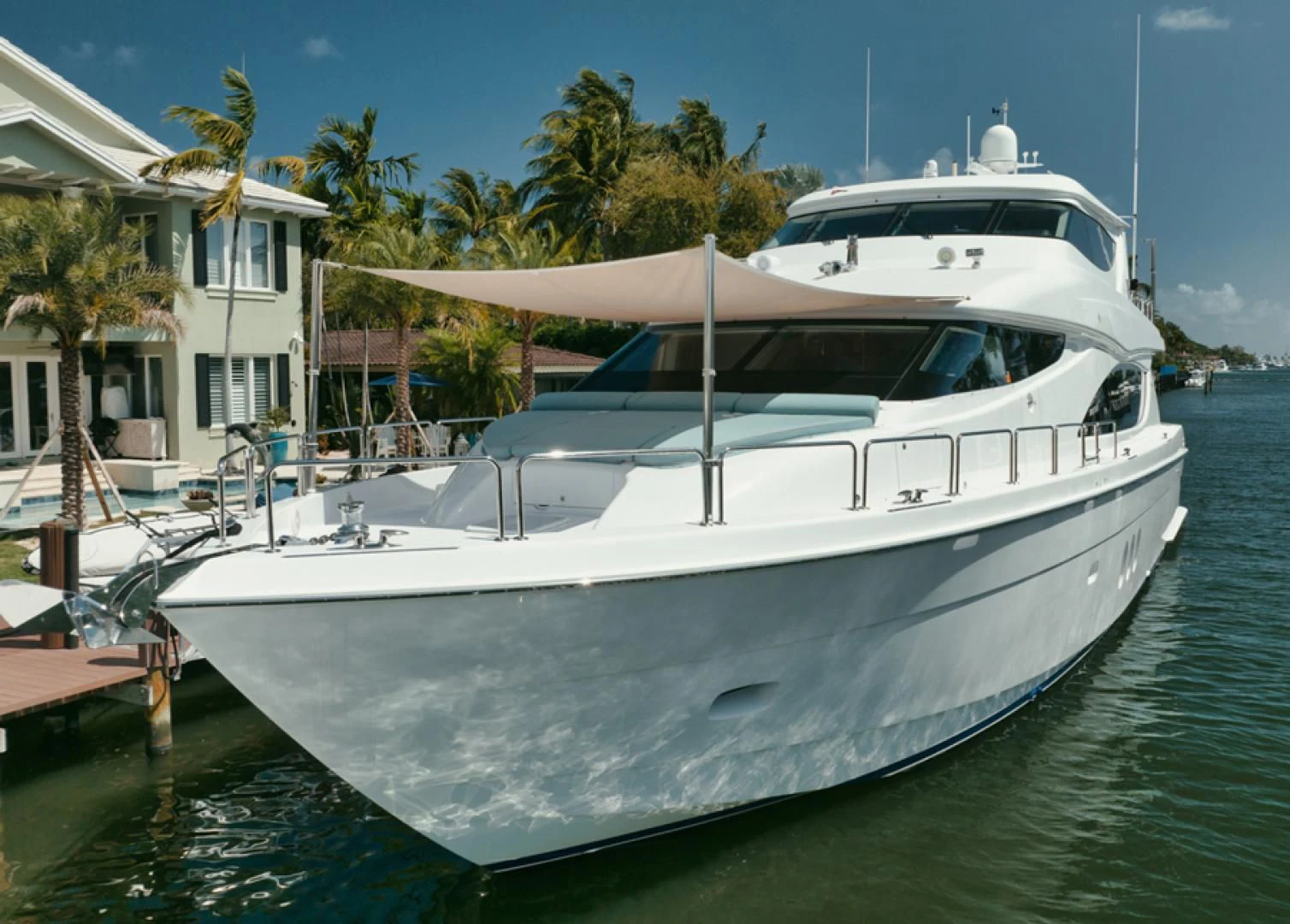 a white yacht in a tropical setting aboard RITZ SEA Yacht for Sale