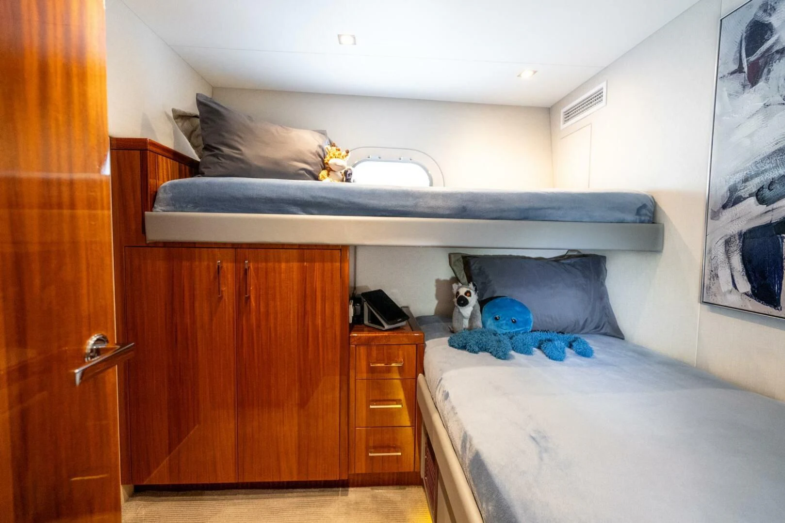 a bed with a cat on it aboard RITZ SEA Yacht for Sale