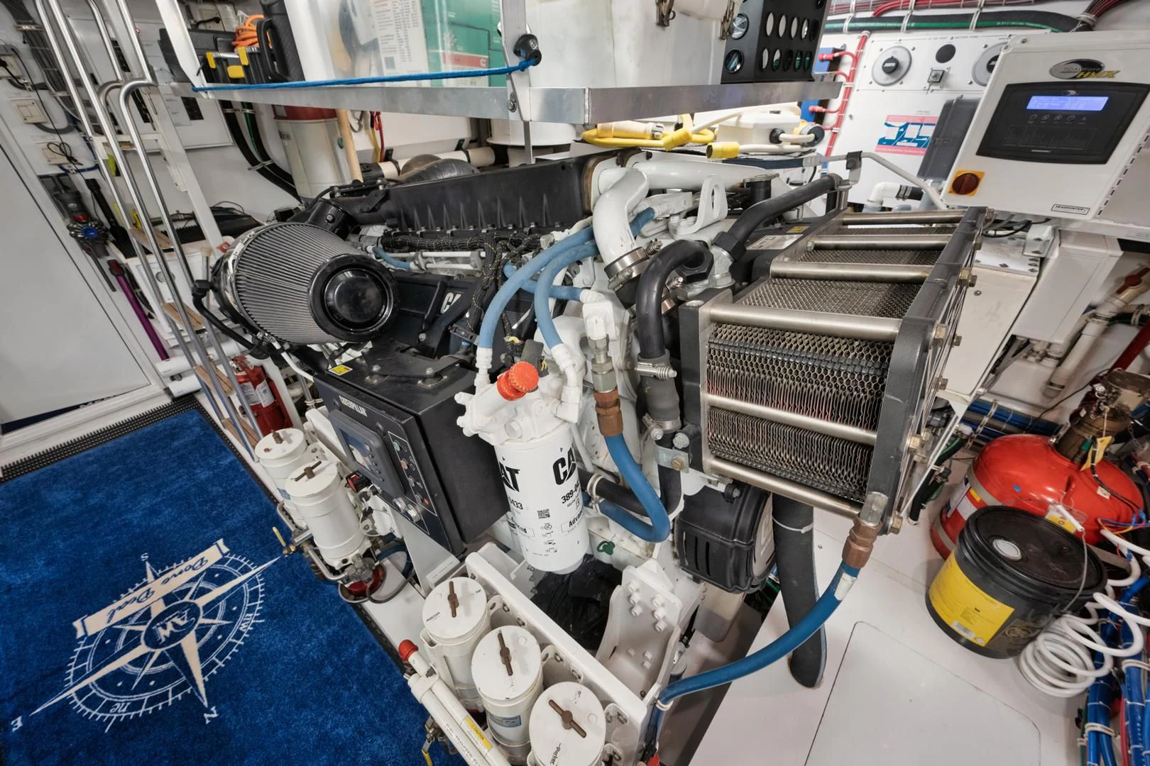 a machine with wires and a blue floor aboard RITZ SEA Yacht for Sale