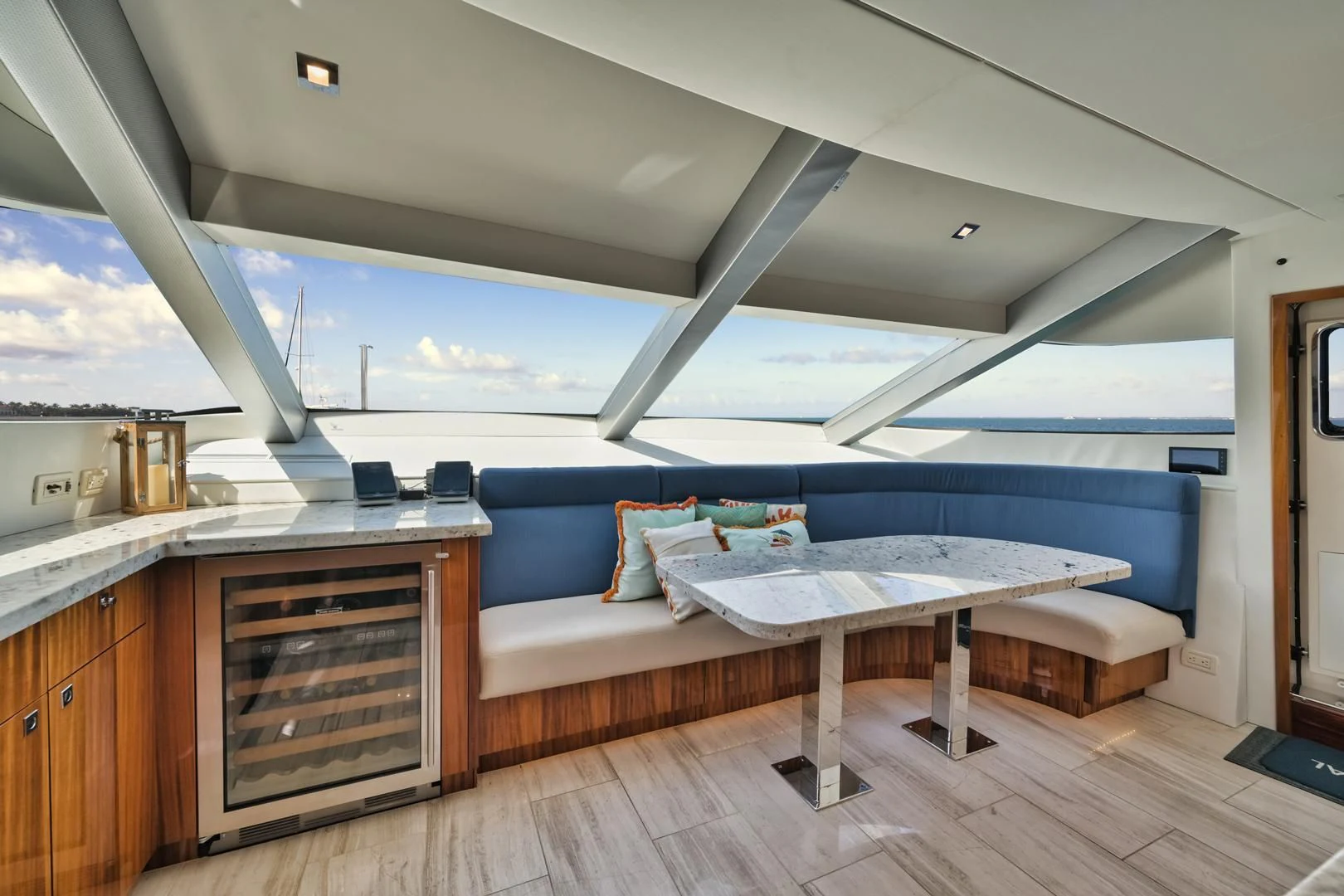 a room with a bed and a table aboard RITZ SEA Yacht for Sale