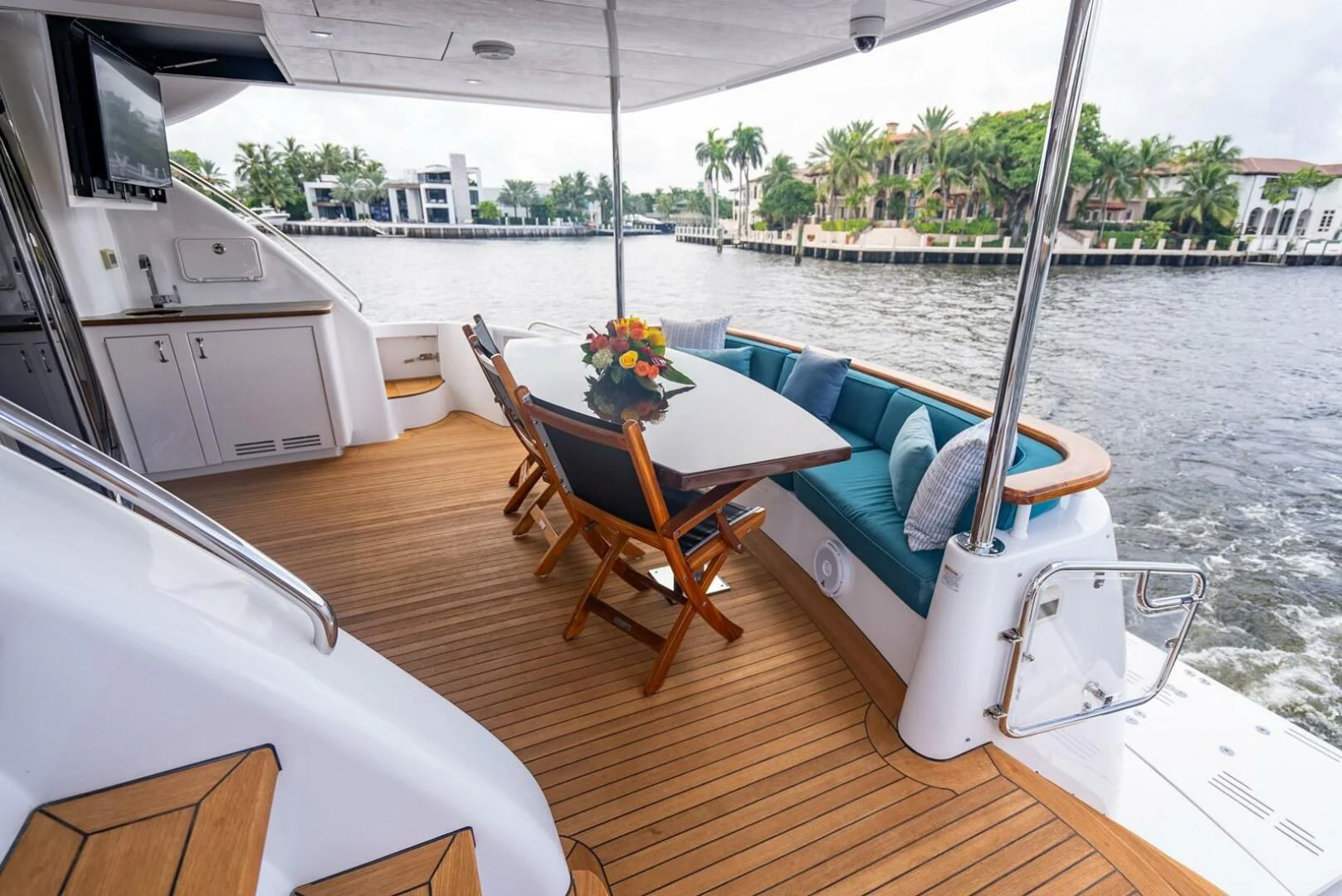 a boat with a table and chairs on it aboard RITZ SEA Yacht for Sale