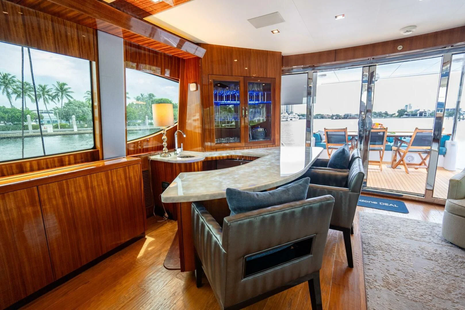 a living room with a large window aboard RITZ SEA Yacht for Sale