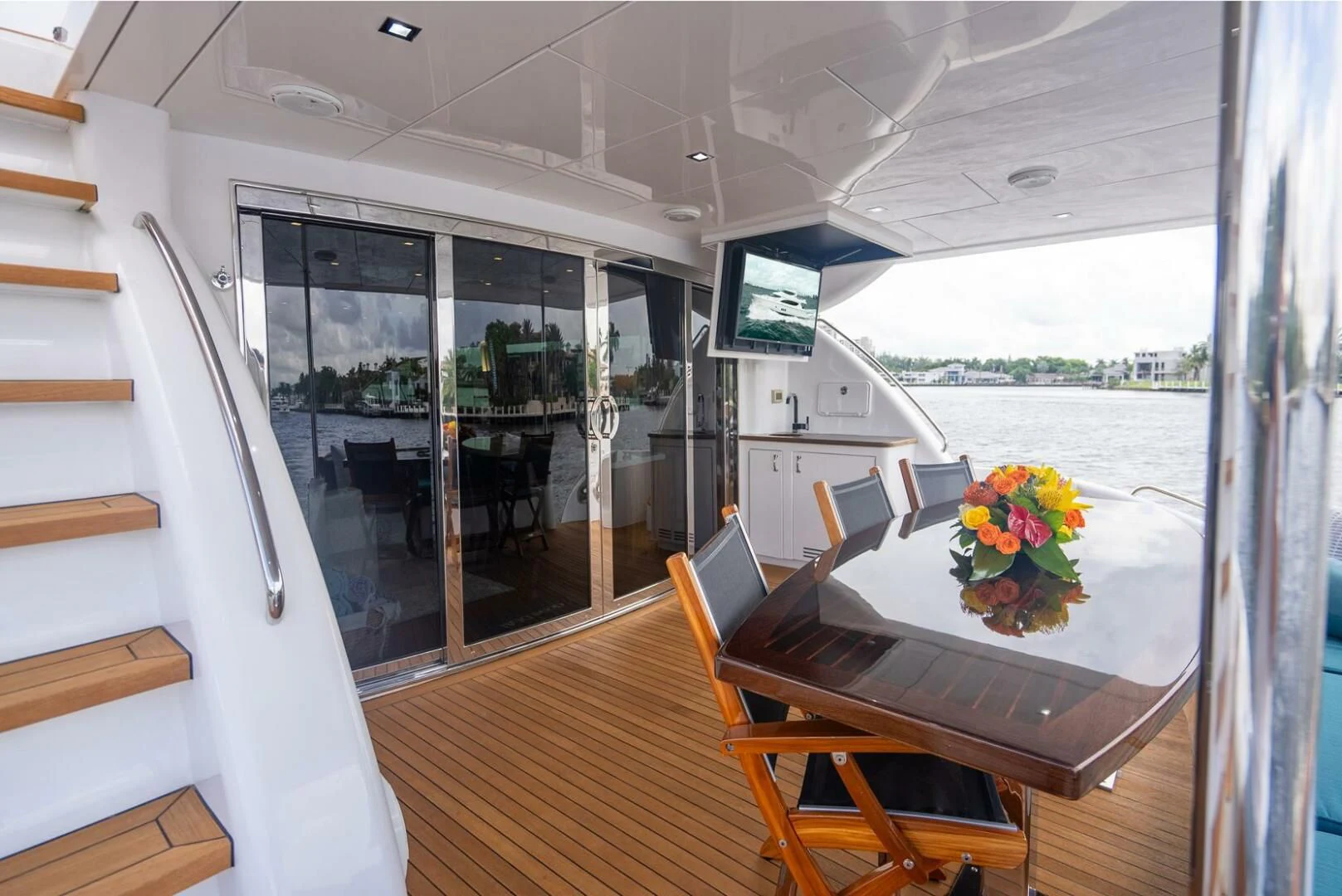 a room with a table and chairs aboard RITZ SEA Yacht for Sale