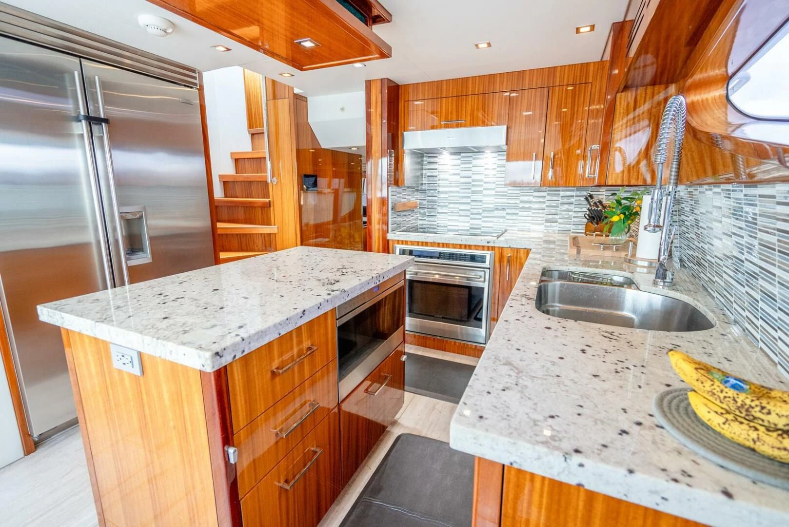a kitchen with a stainless steel sink aboard RITZ SEA Yacht for Sale