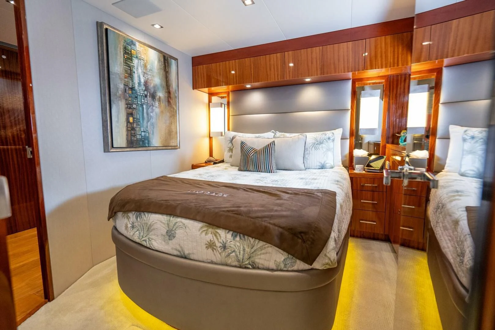 a bedroom with a couple of beds aboard RITZ SEA Yacht for Sale