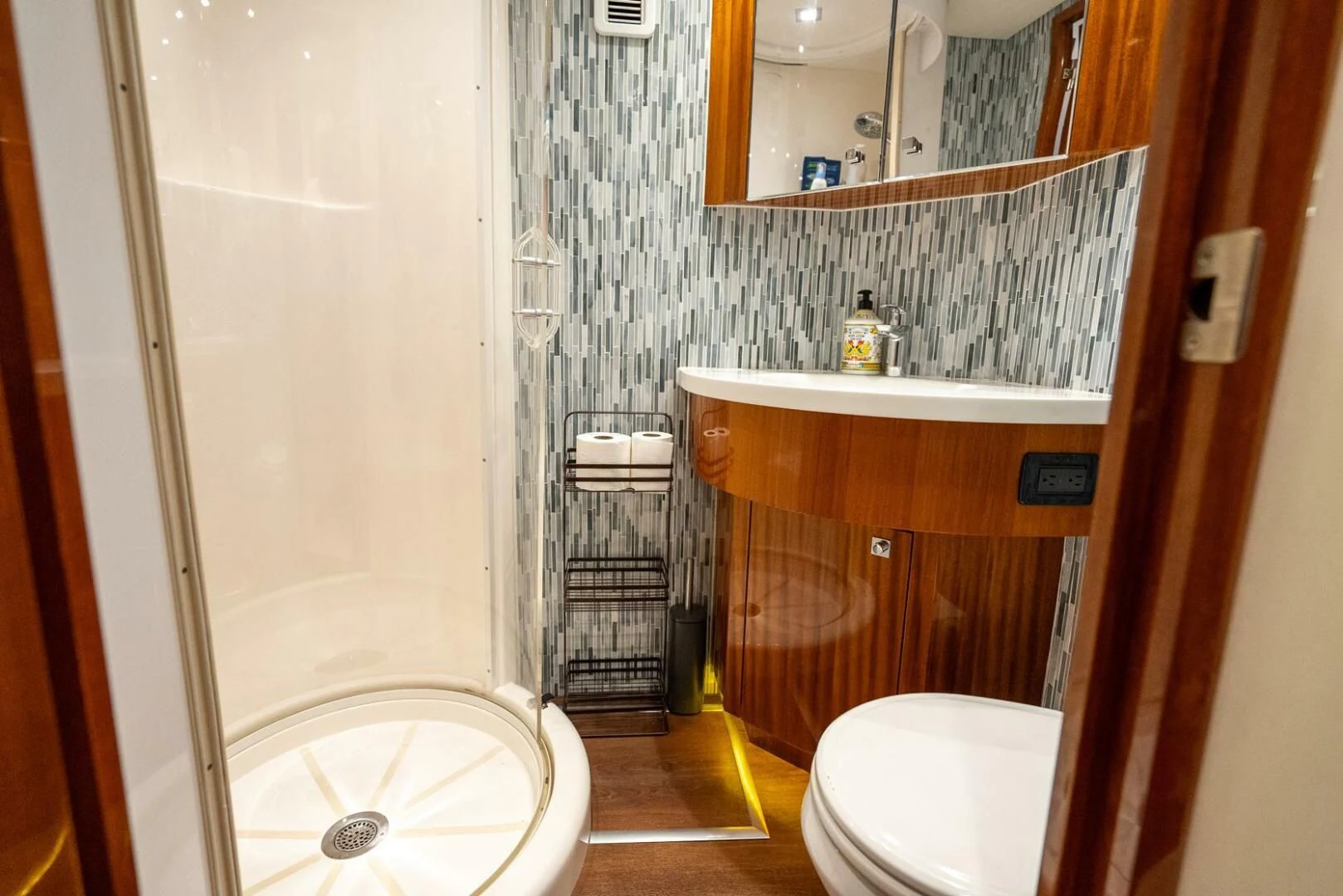a bathroom with a shower and toilet aboard RITZ SEA Yacht for Sale