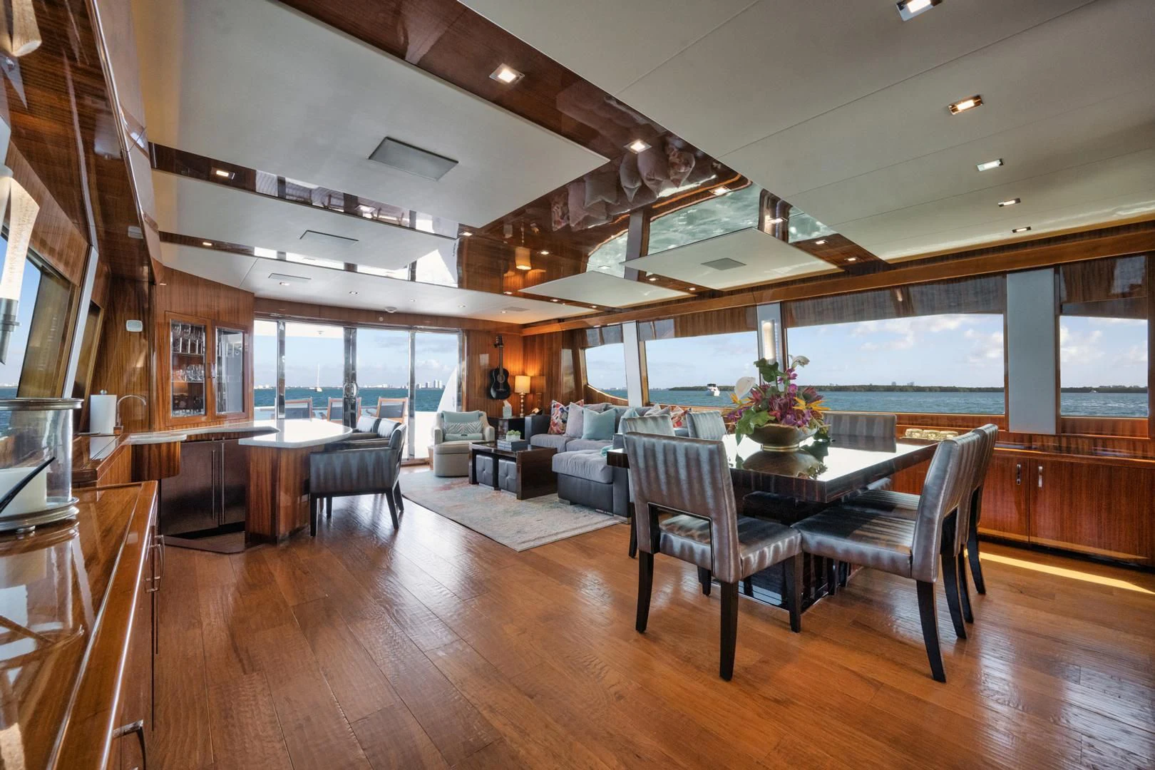 a large living room with a large glass window aboard RITZ SEA Yacht for Sale