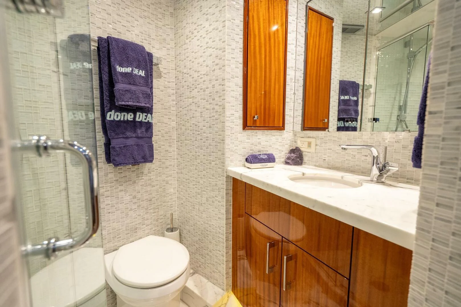 a bathroom with a sink and toilet aboard RITZ SEA Yacht for Sale