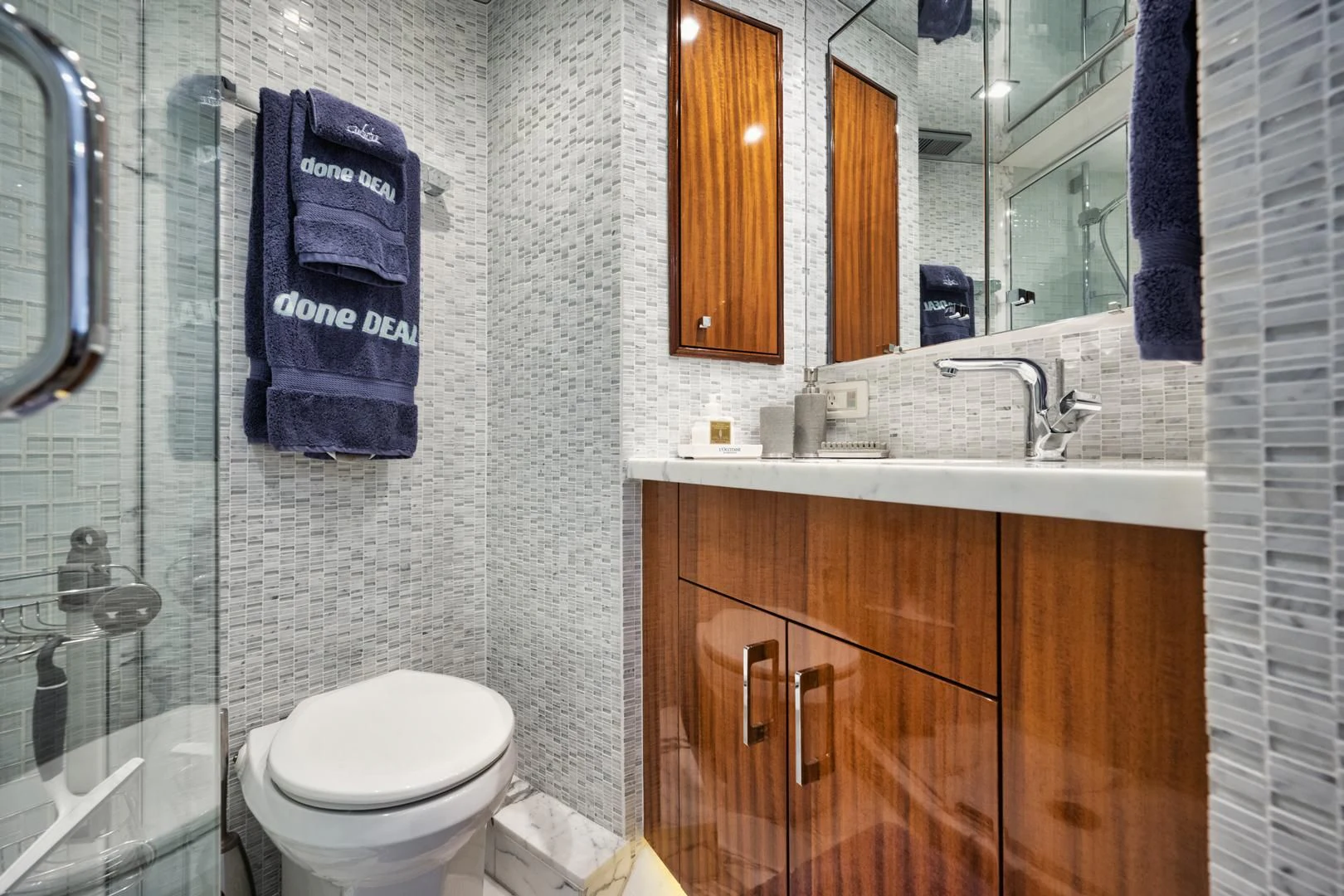 a bathroom with a sink and a toilet aboard RITZ SEA Yacht for Sale