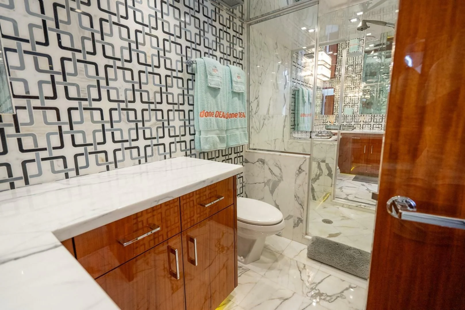 a bathroom with a sink and toilet aboard RITZ SEA Yacht for Sale