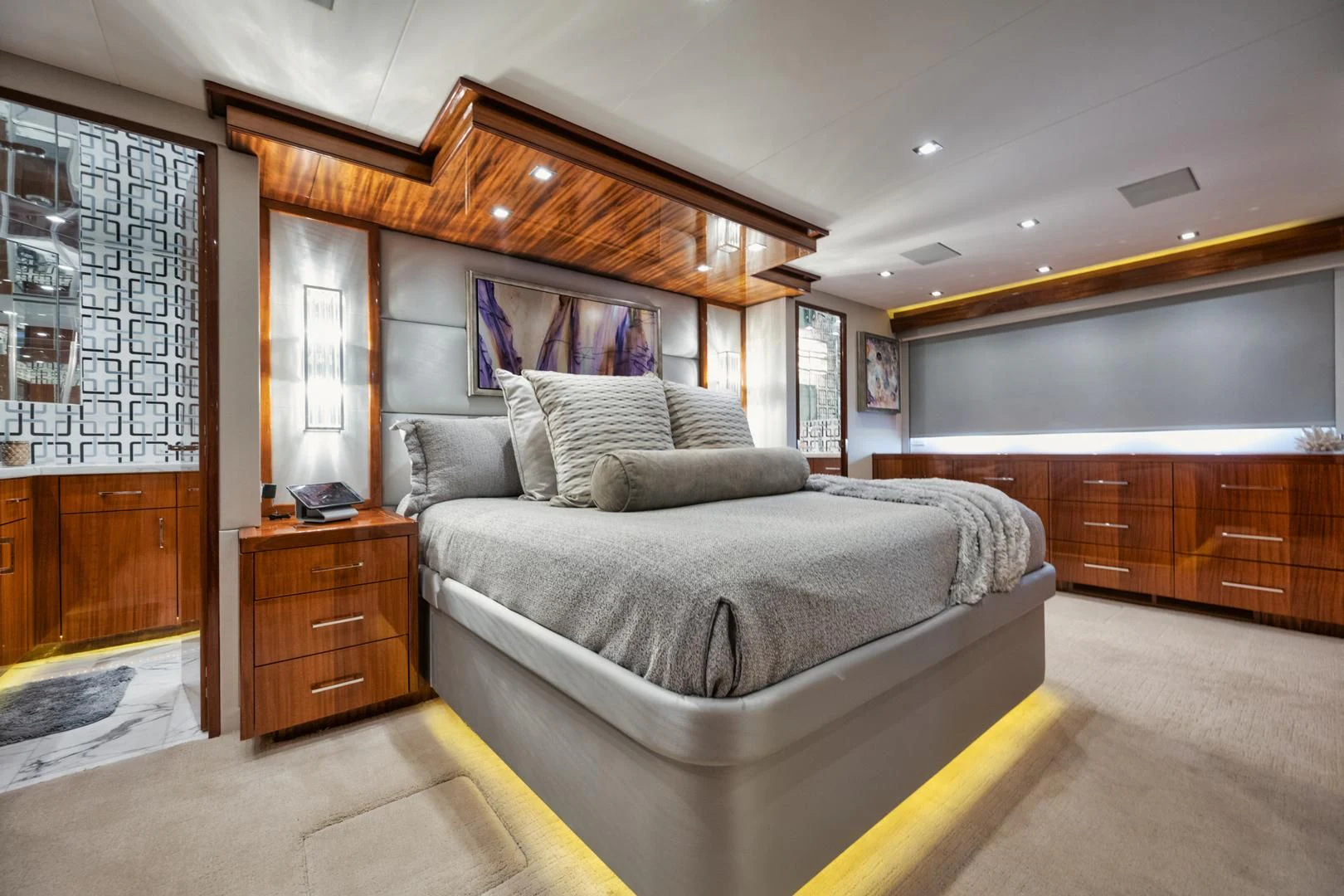 a bedroom with a large bed aboard RITZ SEA Yacht for Sale