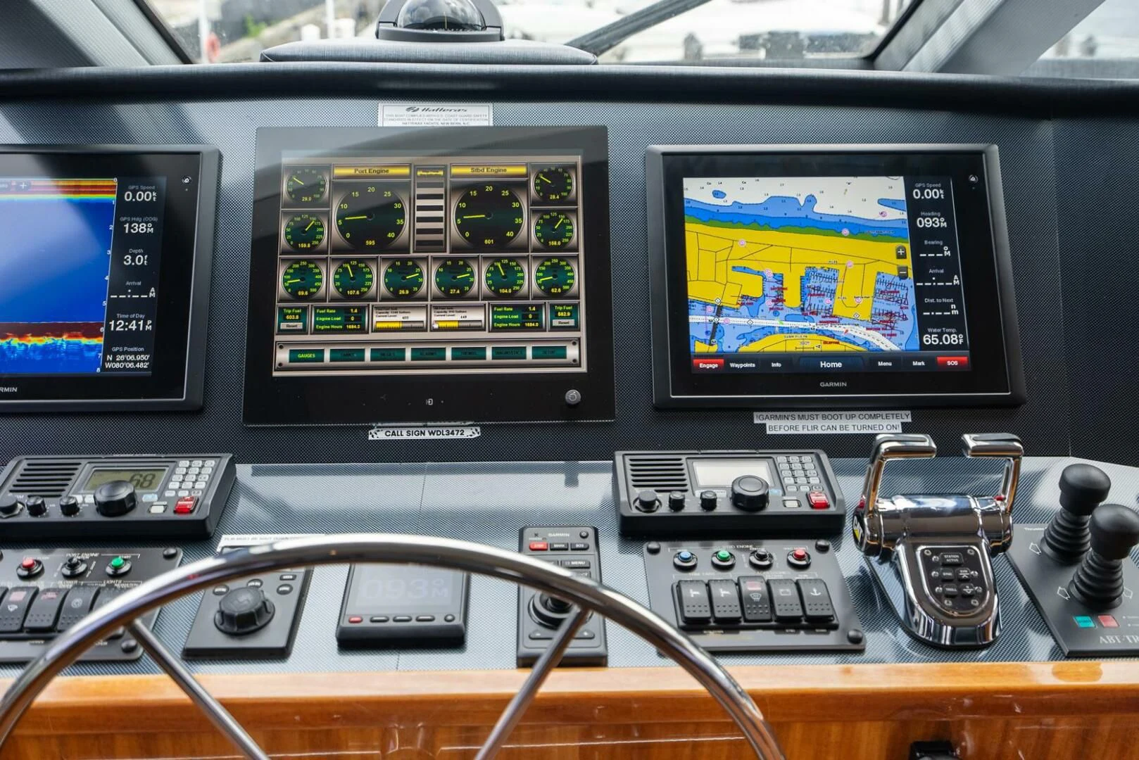 a control panel with a couple of monitors and a couple of screens aboard RITZ SEA Yacht for Sale