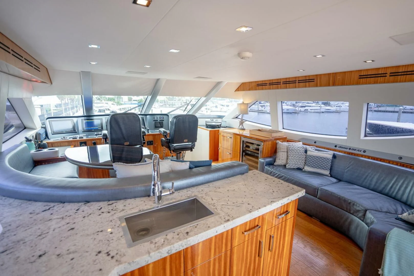a large kitchen and living room aboard RITZ SEA Yacht for Sale