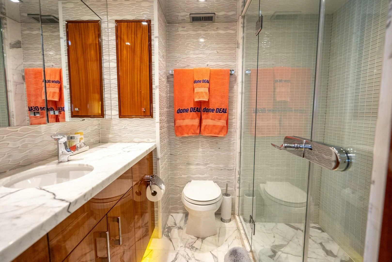 a bathroom with a shower and toilet aboard RITZ SEA Yacht for Sale