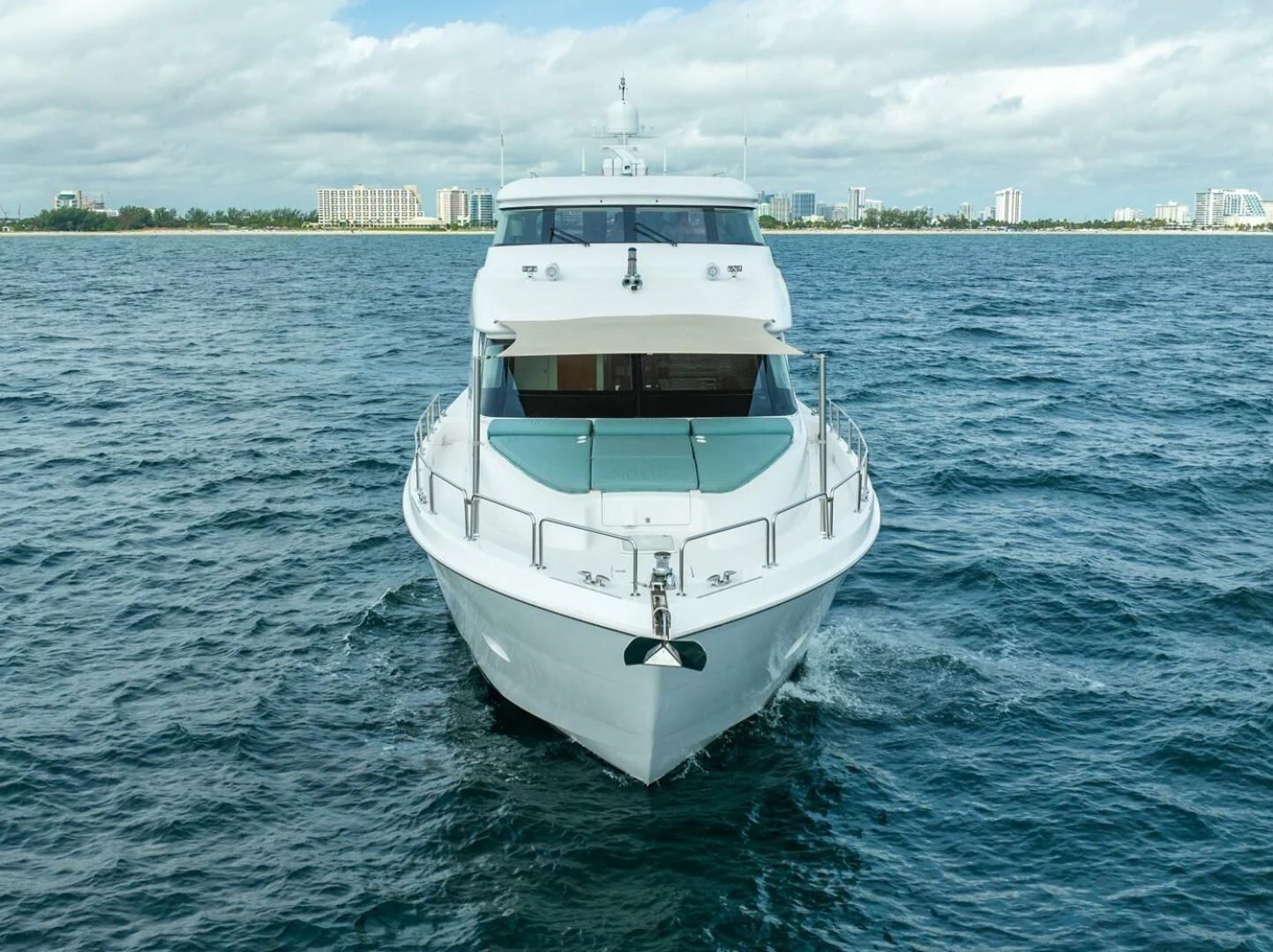 a white boat in the water aboard RITZ SEA Yacht for Sale