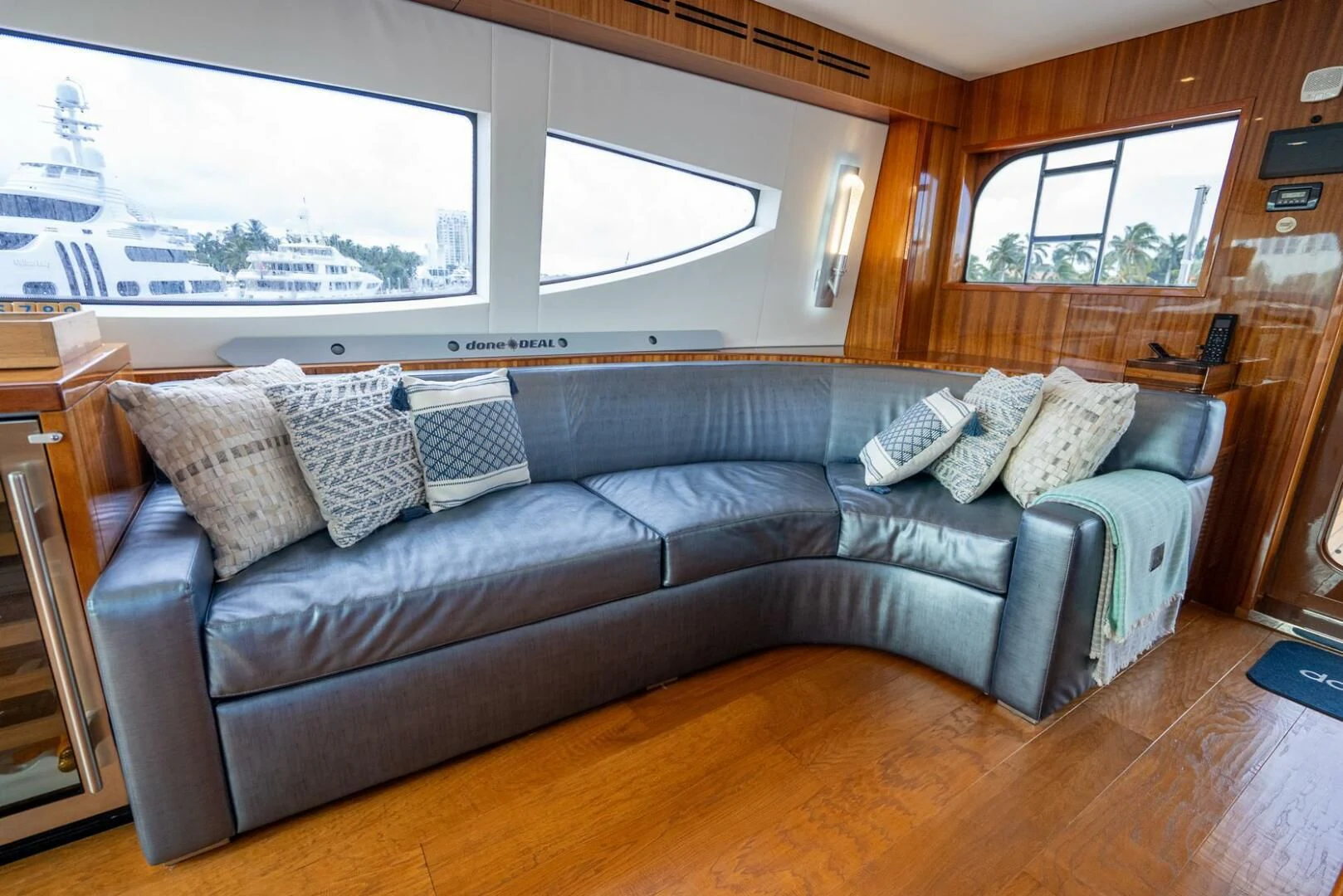 a couch in a living room aboard RITZ SEA Yacht for Sale