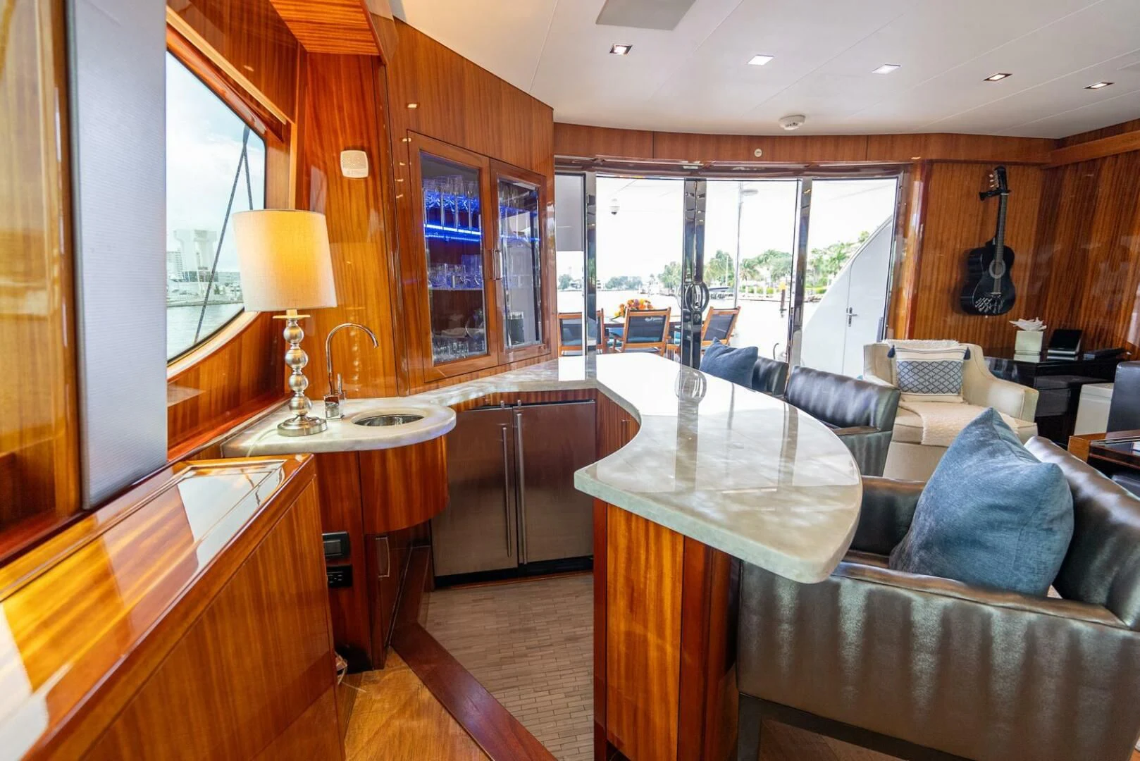 a living room with a couch and a table aboard RITZ SEA Yacht for Sale