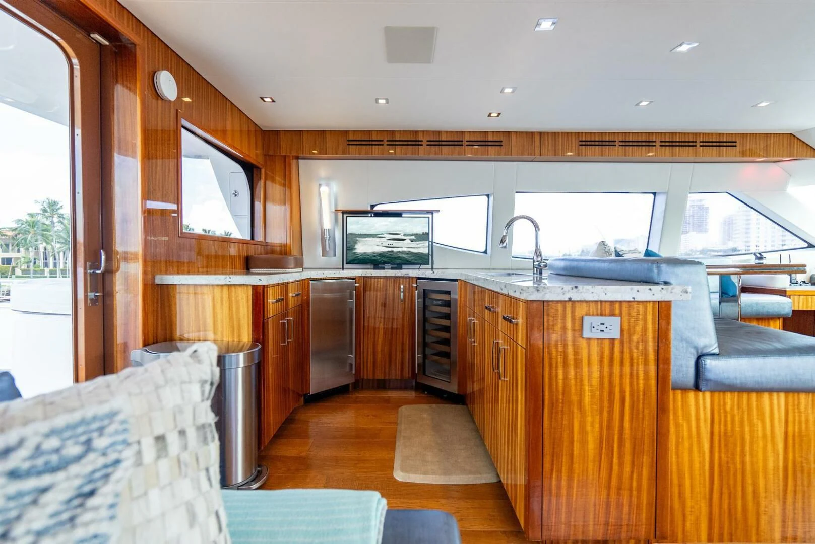 a kitchen with a large island aboard RITZ SEA Yacht for Sale