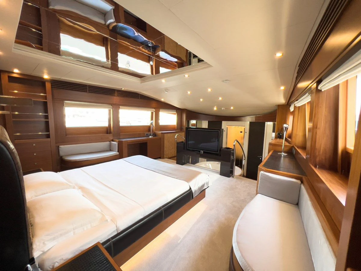 a room with a bed and a tv aboard MATSU Yacht for Sale