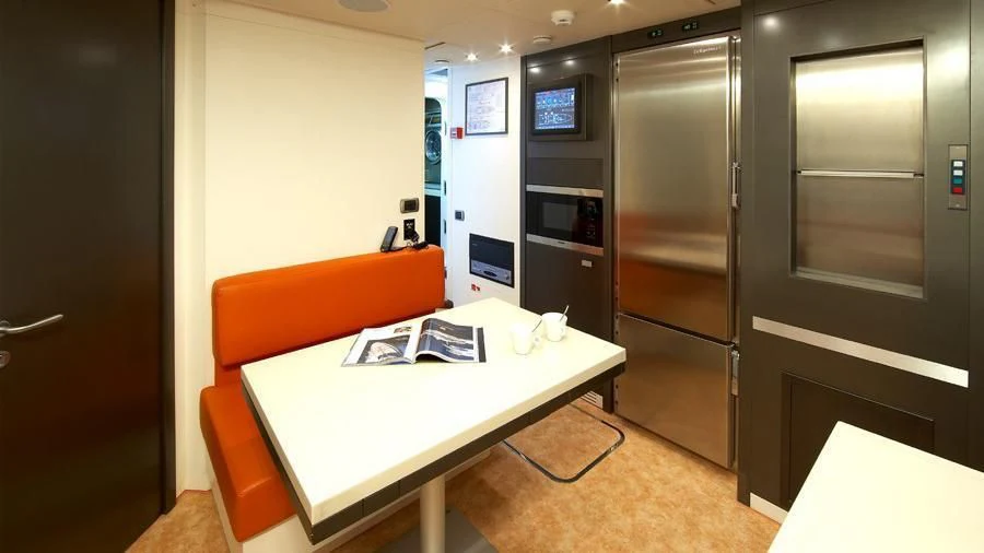 a room with a desk and a bed aboard MATSU Yacht for Sale