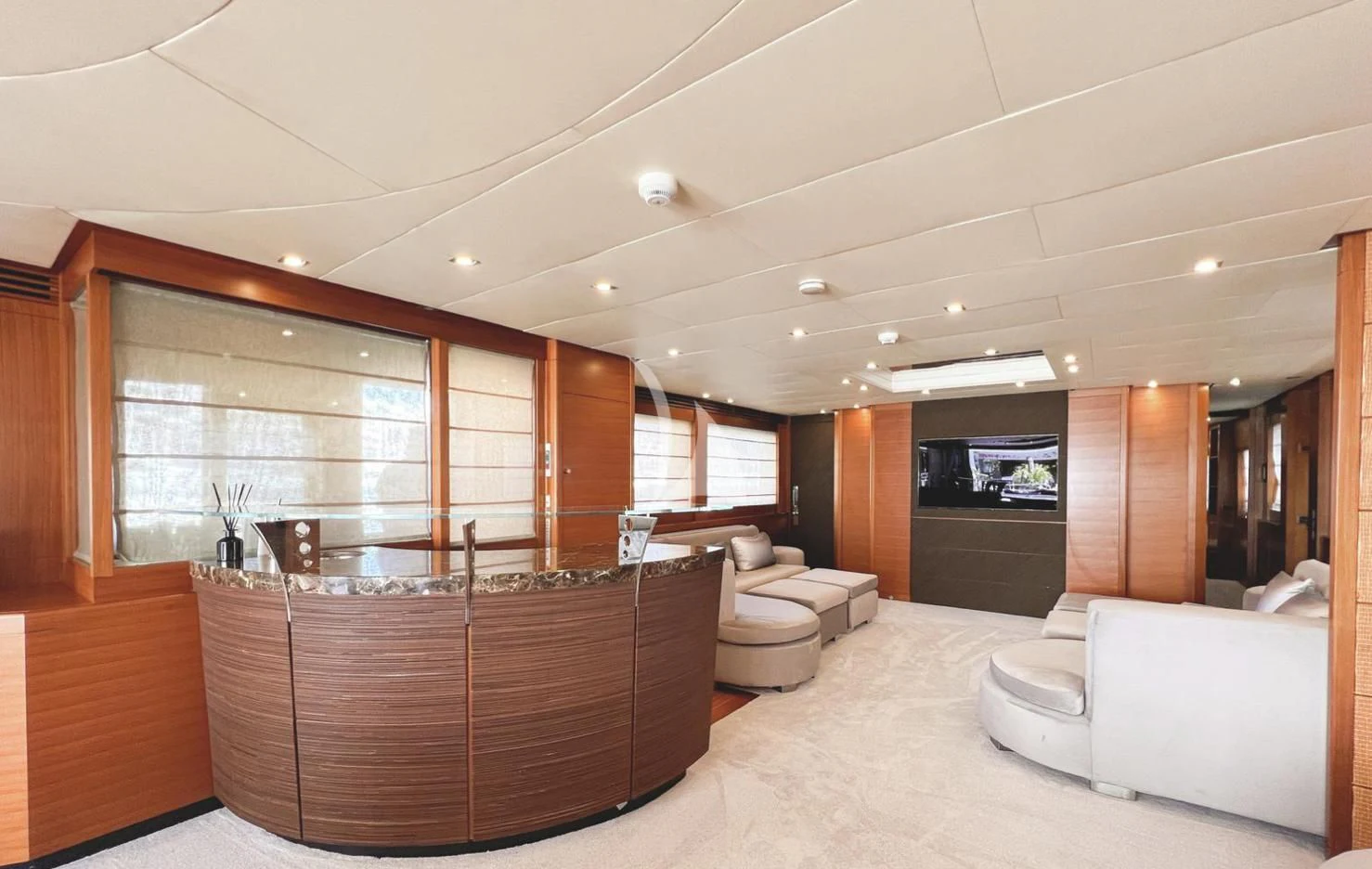 a large room with a large glass window and a large wood cabinet aboard MATSU Yacht for Sale