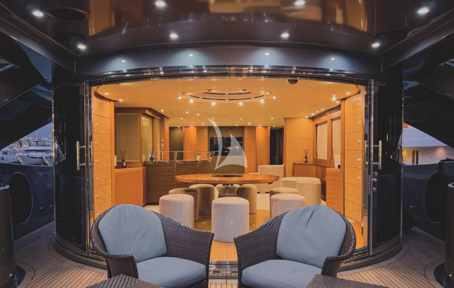 a room with a table and chairs aboard MATSU Yacht for Sale