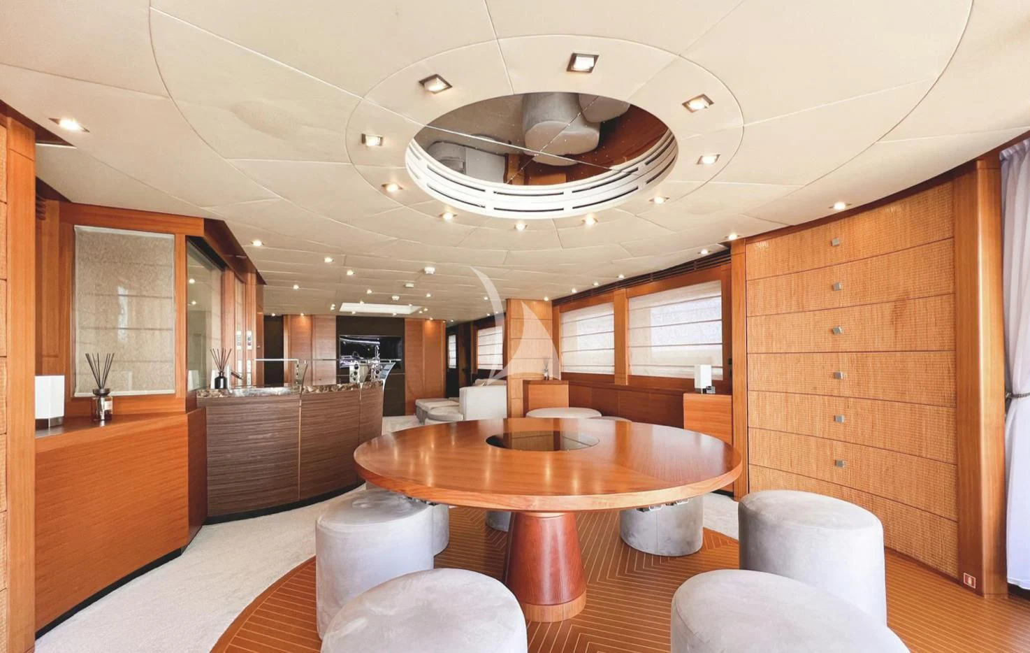 a large kitchen with a dining table aboard MATSU Yacht for Sale