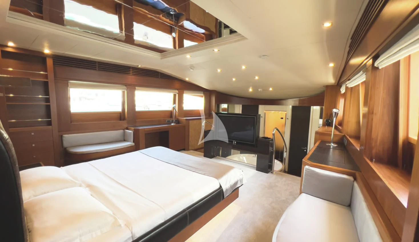 a room with a bed and a piano aboard MATSU Yacht for Sale