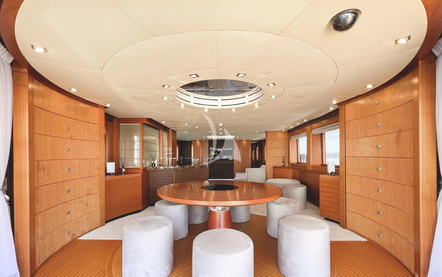 a room with a table and chairs aboard MATSU Yacht for Sale