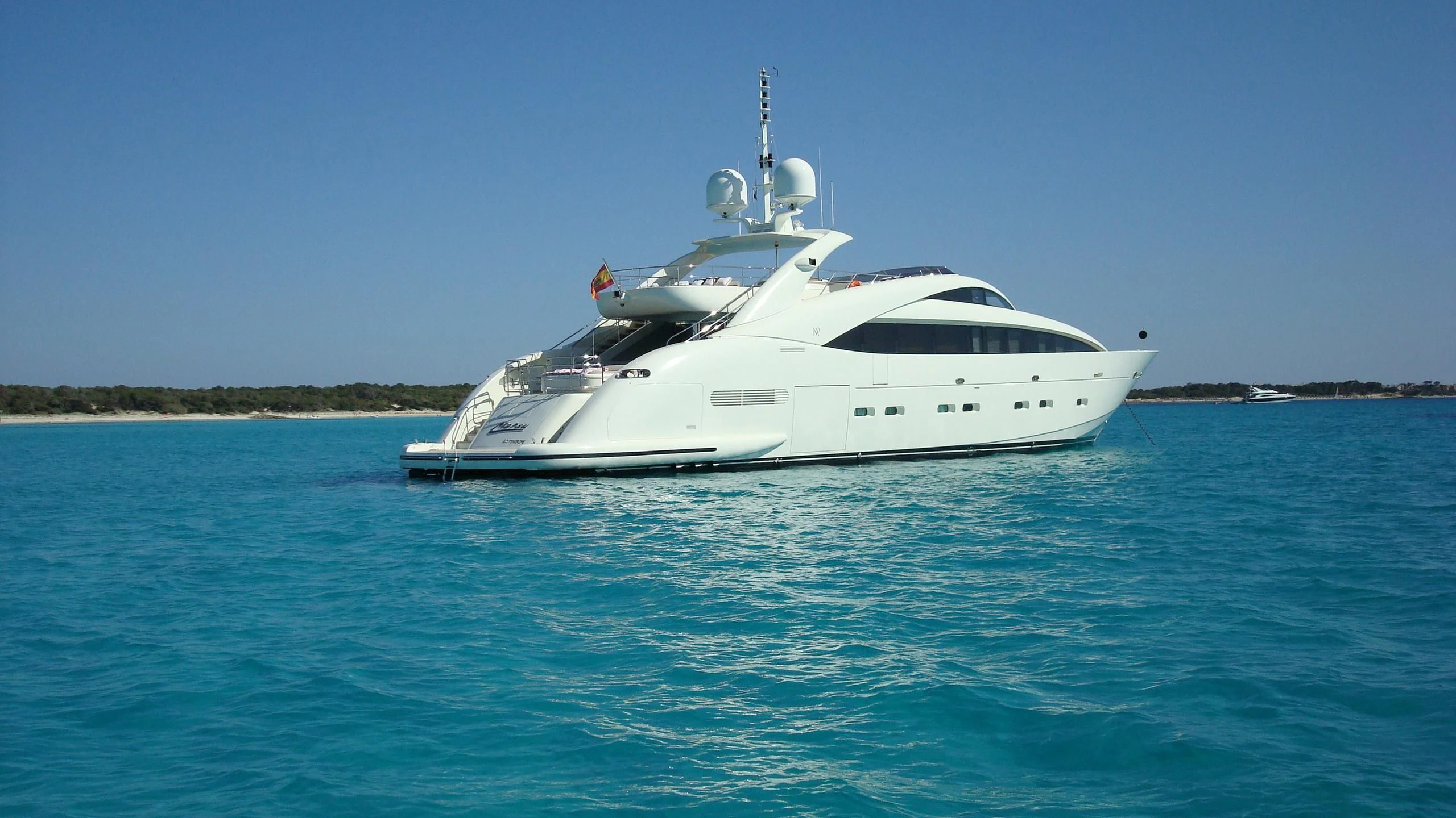 a white yacht in the water aboard MATSU Yacht for Sale