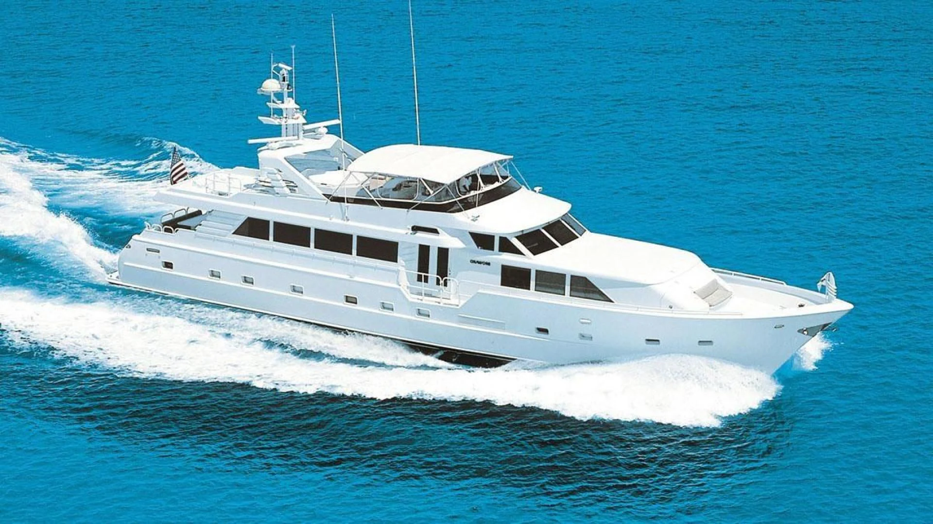 a white yacht on the water aboard HARLINA Yacht for Sale