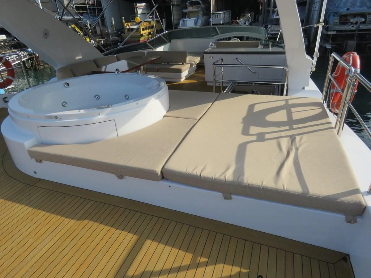 a large white boat in a large room aboard AERBIN Yacht for Sale