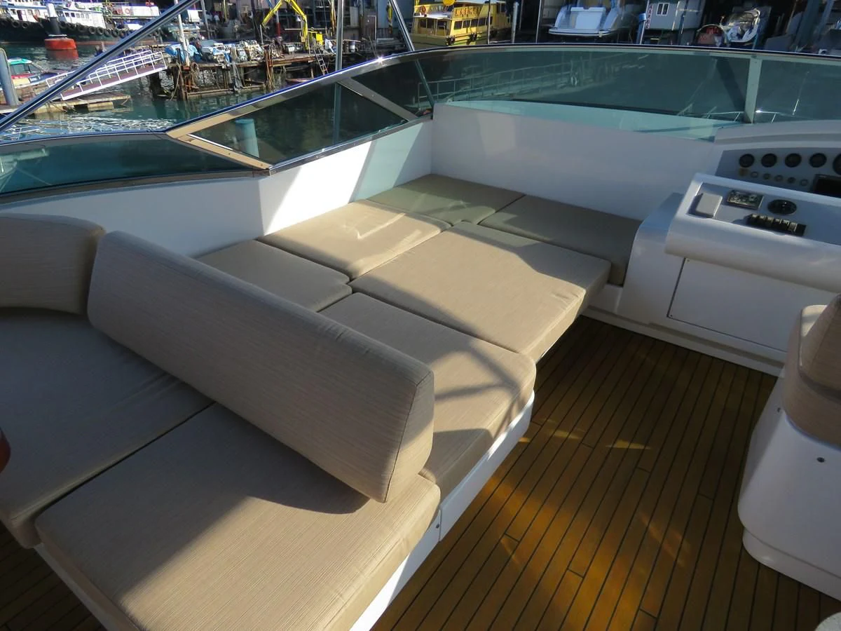 a room with a couch and a pool aboard AERBIN Yacht for Sale