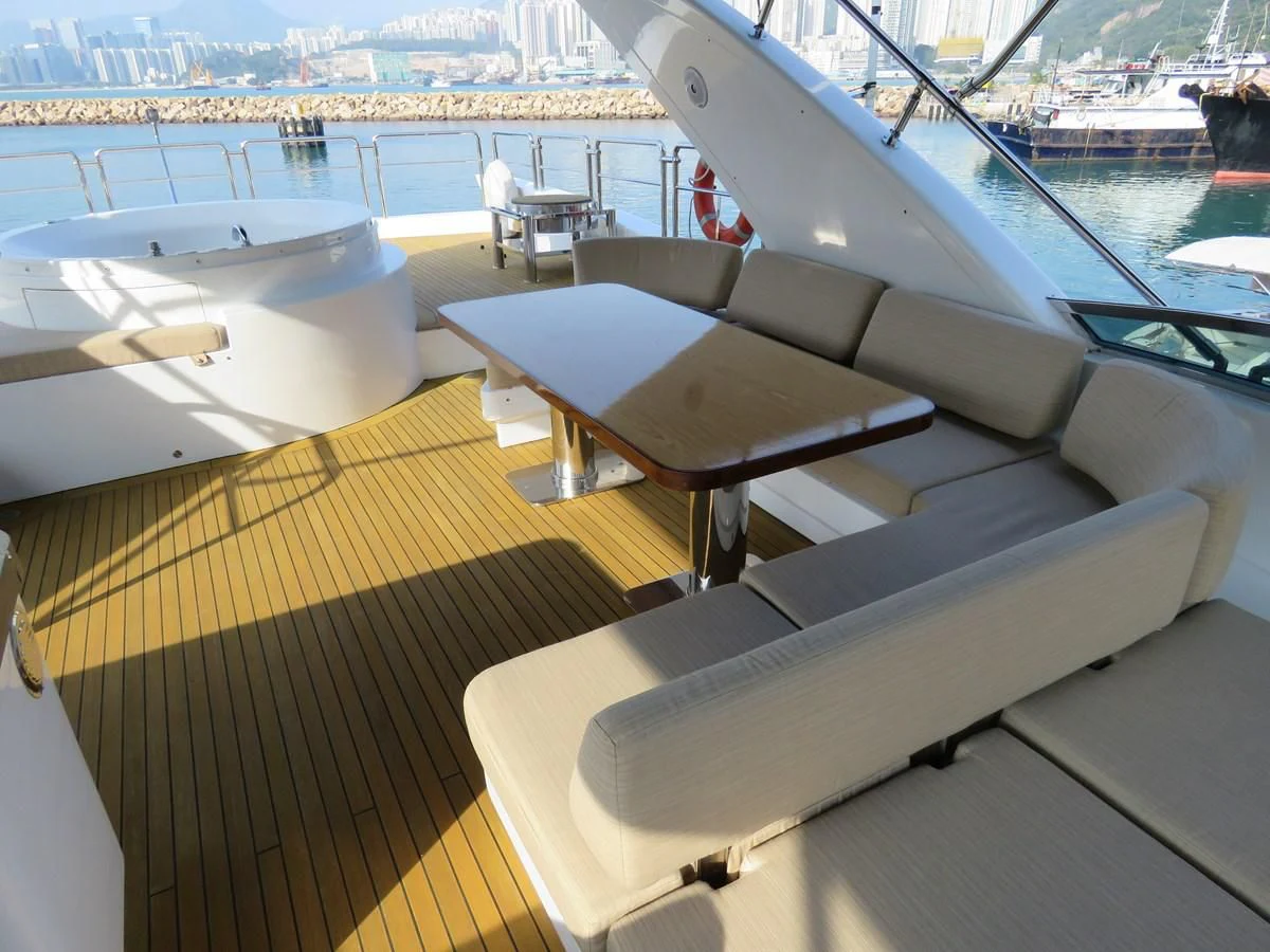 a room with a table and chairs aboard AERBIN Yacht for Sale