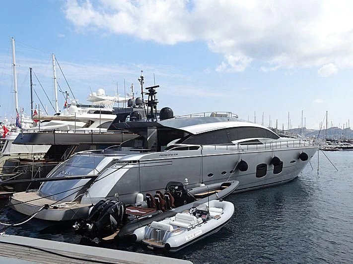 a boat docked at a pier aboard GRACE Yacht for Sale