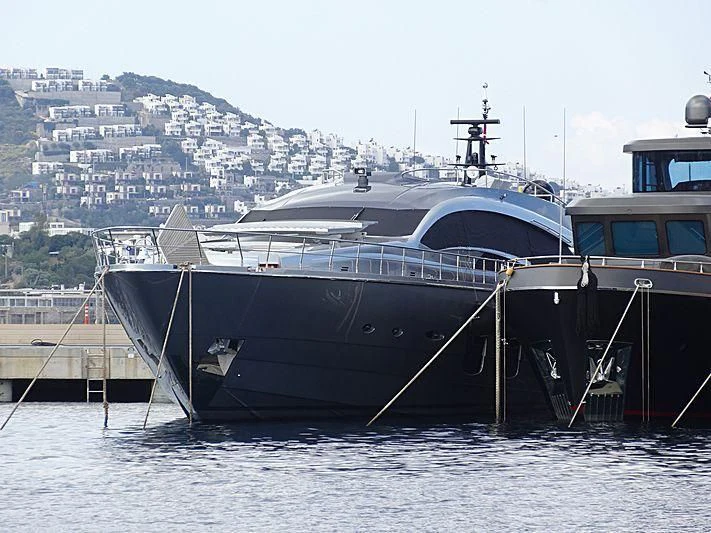 a boat docked at a pier aboard GRACE Yacht for Sale