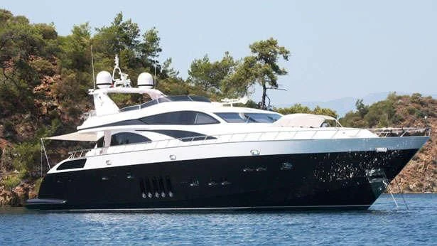 a white yacht on the water aboard WHITE PEARL Yacht for Sale