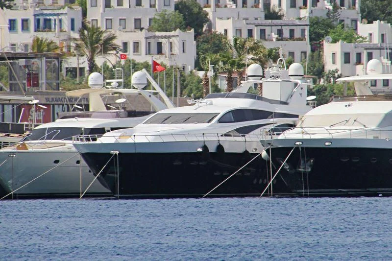 several boats are parked in the water aboard WHITE PEARL Yacht for Sale