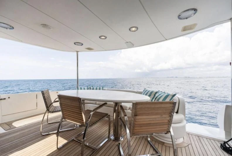a table and chairs on a boat aboard NORDLYS Yacht for Sale