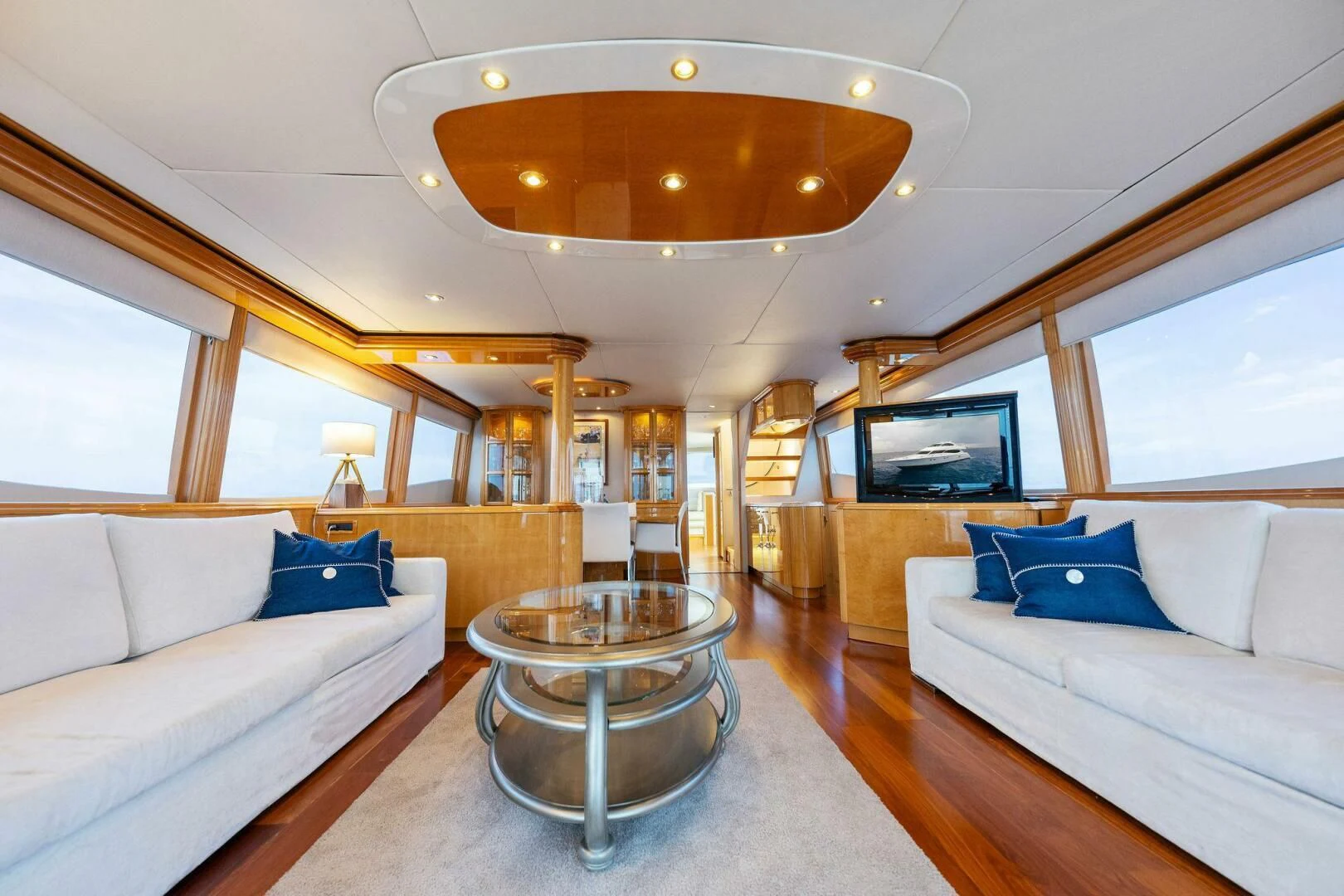 a living room with a couch and a table aboard NORDLYS Yacht for Sale