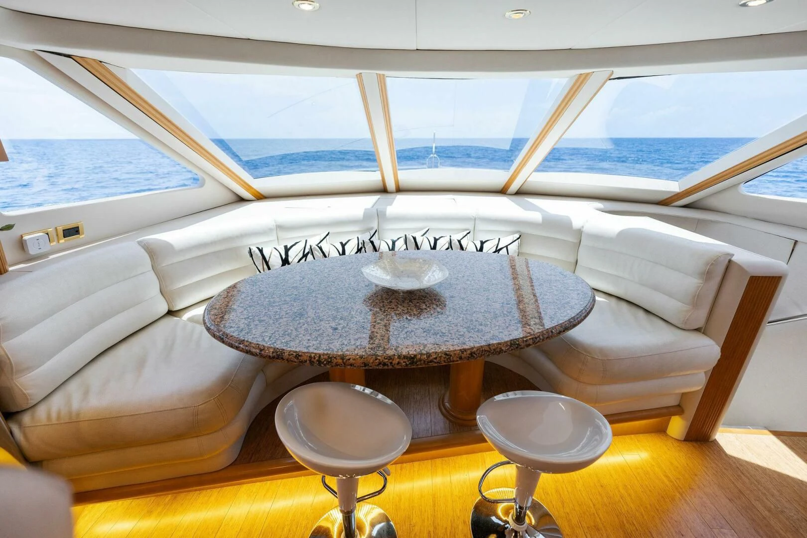a table in front of a boat aboard NORDLYS Yacht for Sale