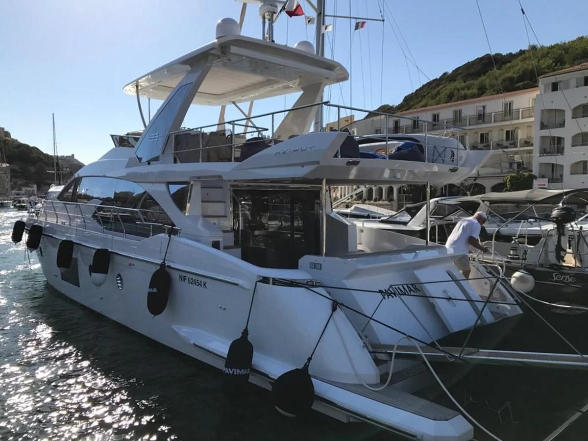 a boat docked in a harbor aboard PAVIMAR II Yacht for Sale