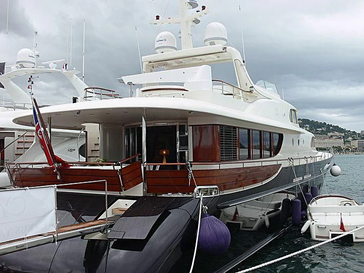 a boat docked at a pier aboard MAISHA Yacht for Sale