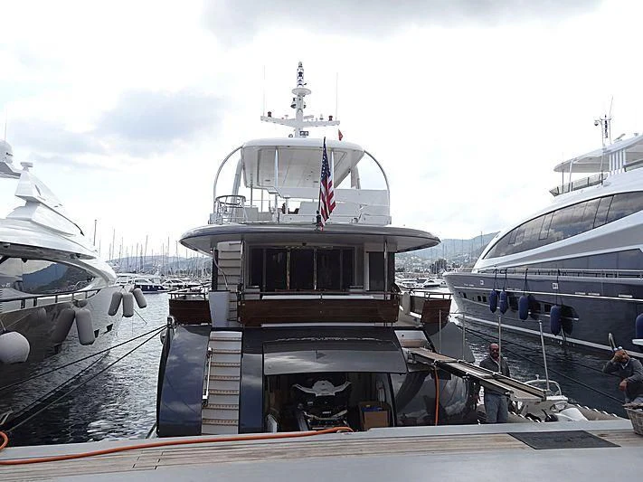 a boat docked at a pier aboard MAISHA Yacht for Sale