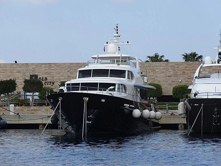 a boat docked at a pier aboard MAISHA Yacht for Sale