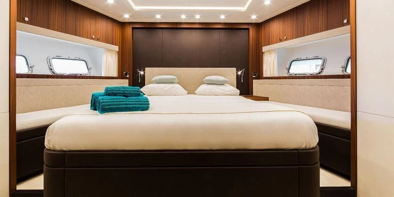 a bed in a room aboard SEAWOLF Yacht for Sale